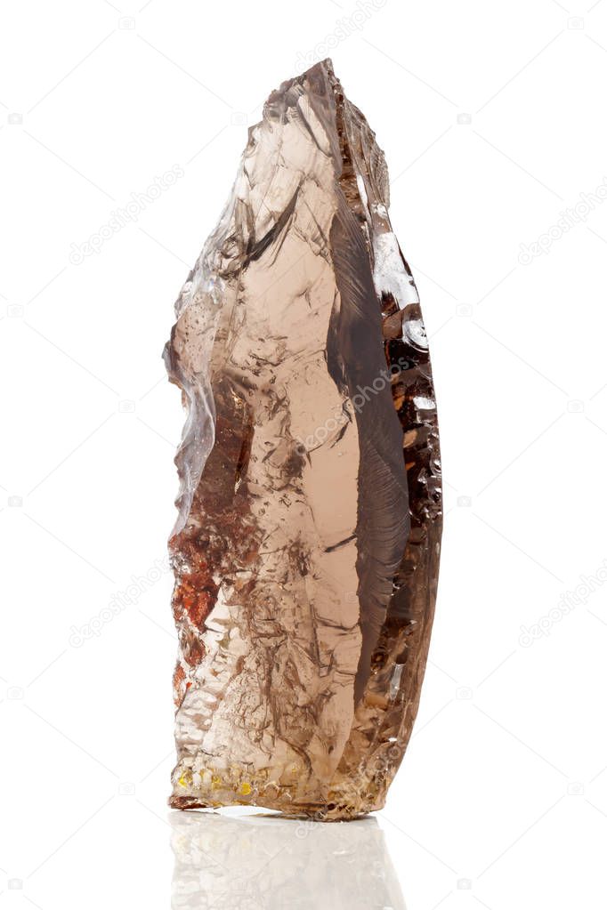 Macro mineral stone Smoky quartz, rauchtopaz on a white background close up
