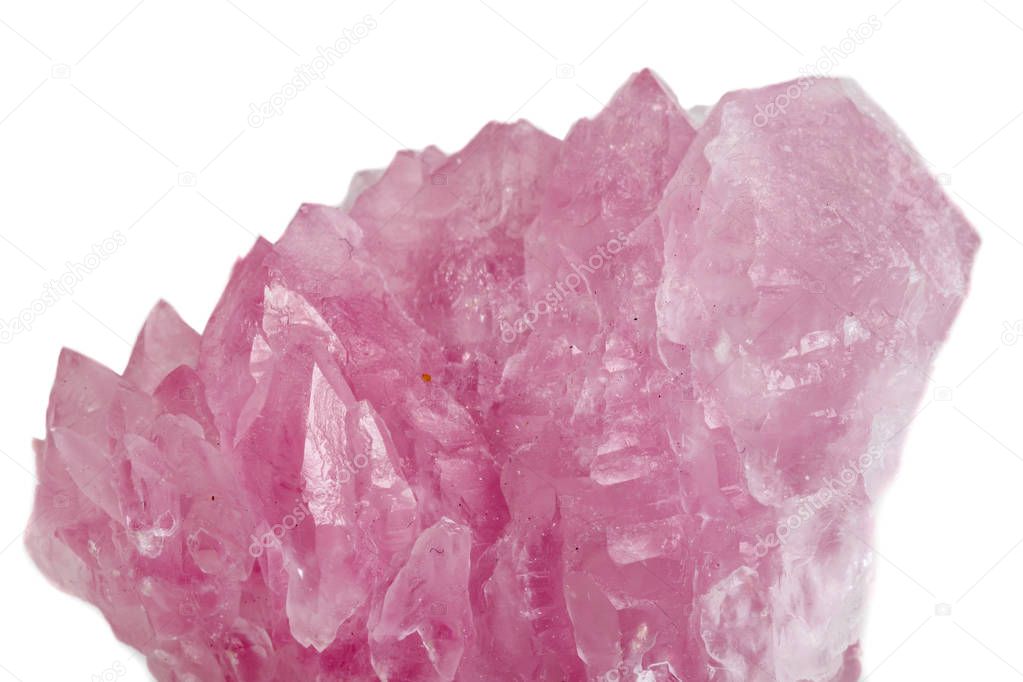 Macro mineral stone Rose quartz on white background close-up