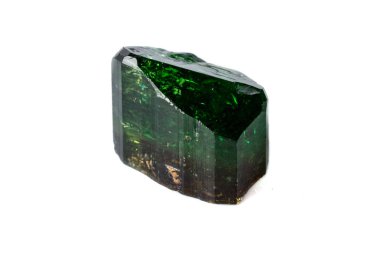 Macro mineral Chrome Dravite Tourmaline on a white background close up