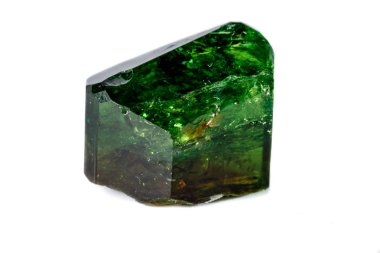 Macro mineral Chrome Dravite Tourmaline on a white background close up