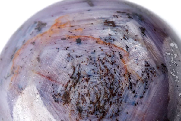 Macro of mineral Corundum Ruby Sapphire on white background close up