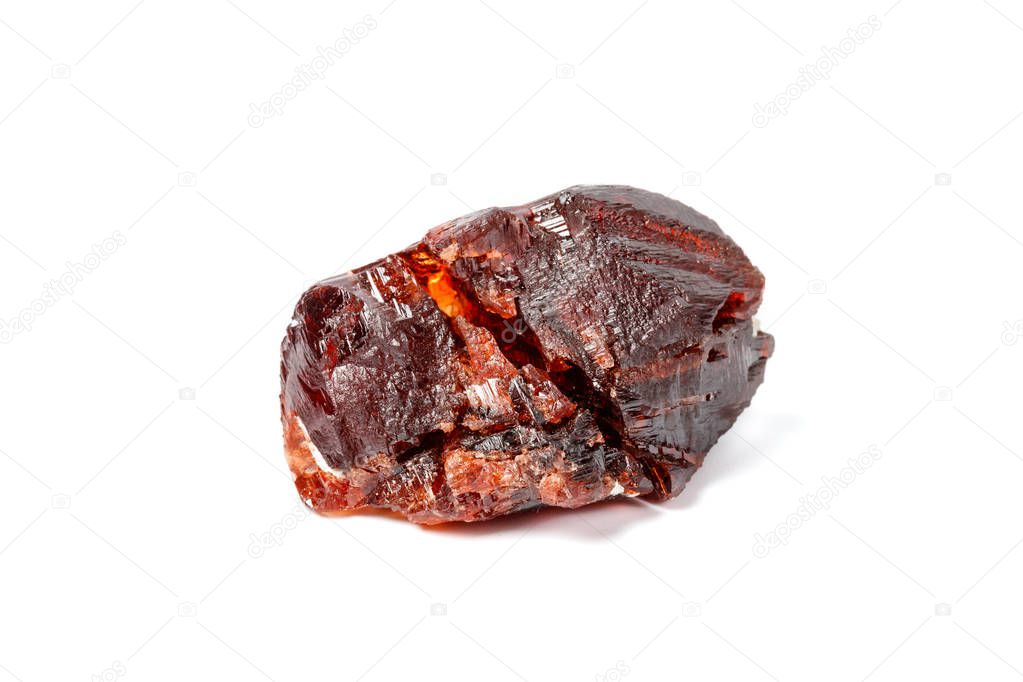 Macro mineral stone Garnet Spessartine on a white background close up