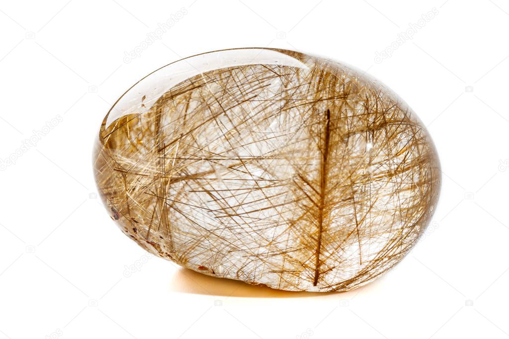 Macro mineral quartz hairy stone, quartz with rutile on a white background close up