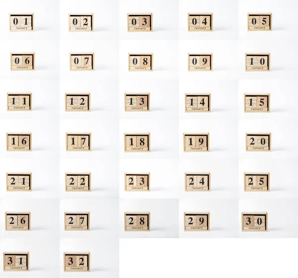 木製カレンダー 月白い背景にクローズ アップ — ストック写真