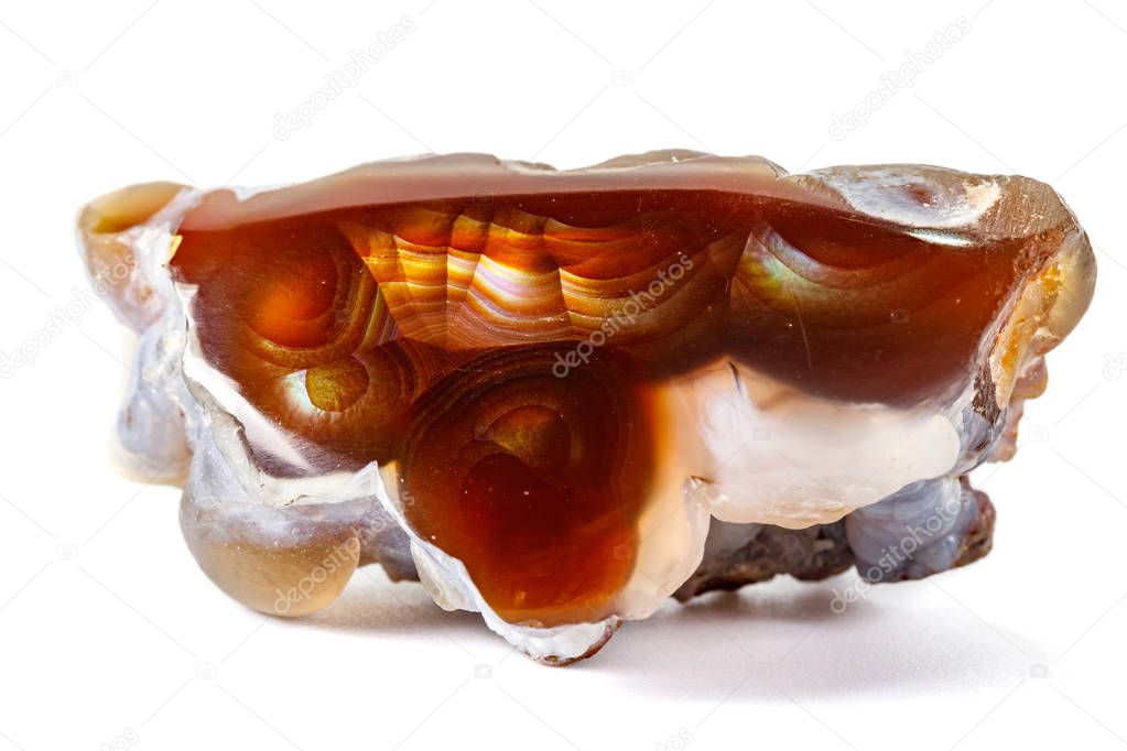 Macro mineral stone fiery Agate on a white background close up