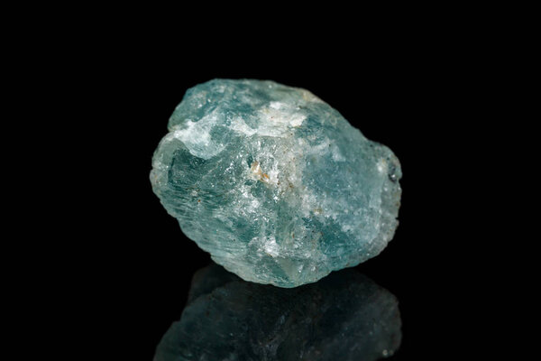 macro mineral stone aquamarine on a black background