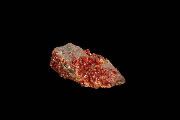 Macro mineral stone Vanadinite on a black background — Stock Photo, Image