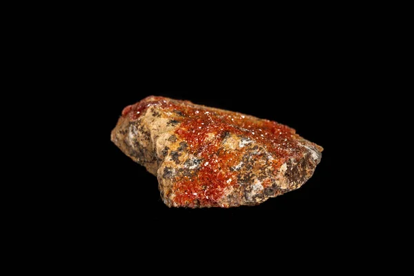 Macro mineral stone Vanadinite on a black background — Stock Photo, Image