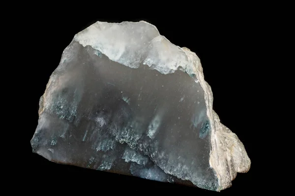 Macro piedra mineral cuarzo ahumado sobre un fondo negro — Foto de Stock