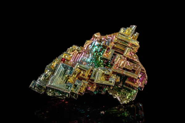 Macro of the stone bismuth mineral on a black background — Stock Photo, Image