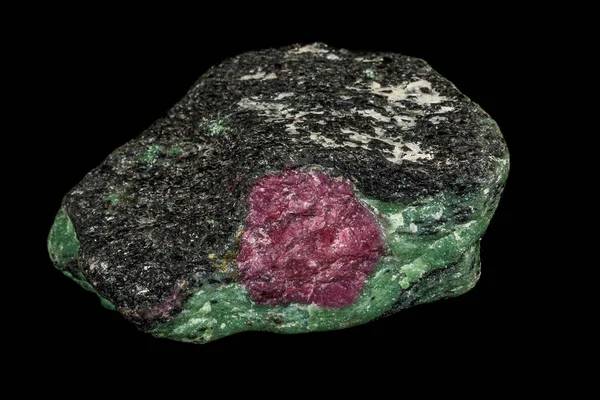 Macro of mineral stone ruby in rock on black background — Stock Photo, Image