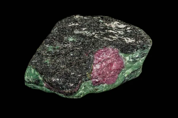 Macro of mineral stone ruby in rock on black background — Stock Photo, Image