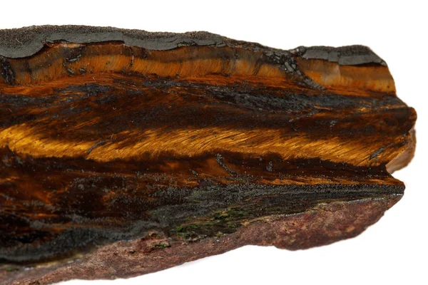 Macro stenen tiger eye mineraal rots op zwarte achtergrond — Stockfoto