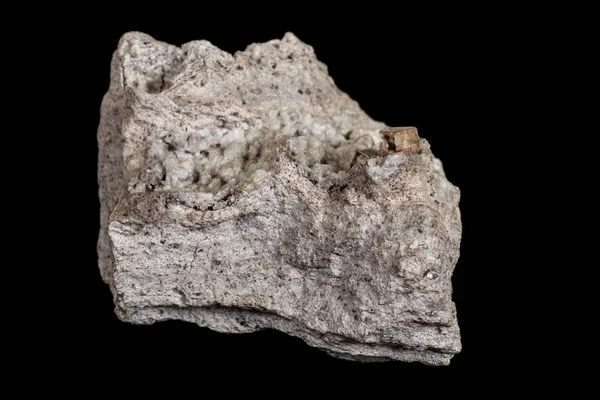 Macro pietra Topaz minerale in roccia su sfondo nero — Foto Stock