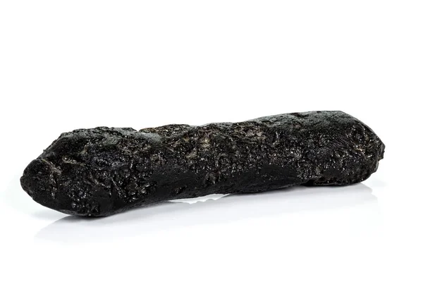 Макростоун мінеральний метеоритний тектит на білому тлі — стокове фото