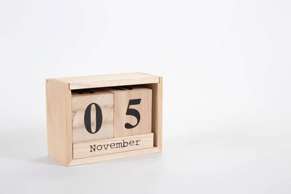 Wooden calendar November 05 on a white background — Stock Photo, Image