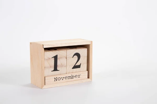 Houten kalender 12 november op een witte achtergrond — Stockfoto