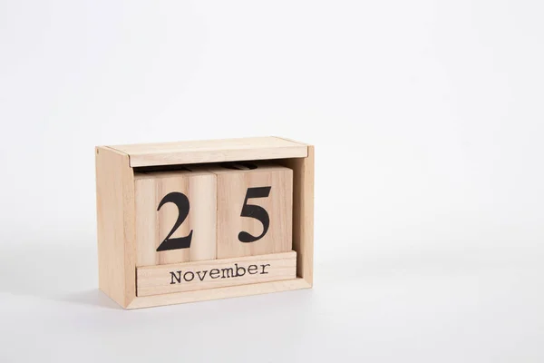 Holzkalender 25. November auf weißem Hintergrund — Stockfoto