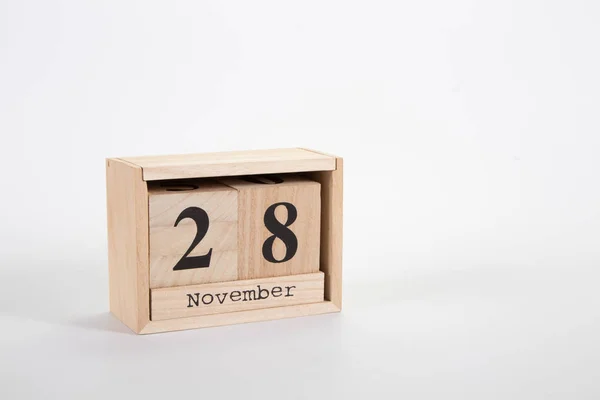 Holzkalender 28. November auf weißem Hintergrund — Stockfoto