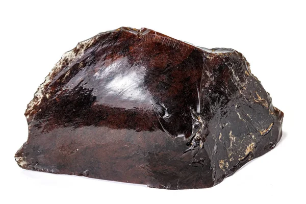 Macro Obsidiana piedra mineral sobre fondo blanco —  Fotos de Stock