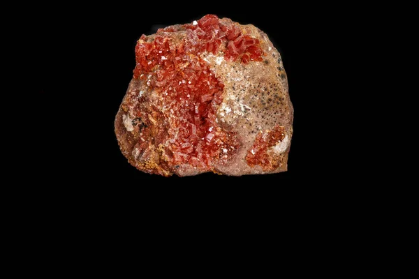 Macro mineral stone Vanadinite on a black background — Stock Photo, Image