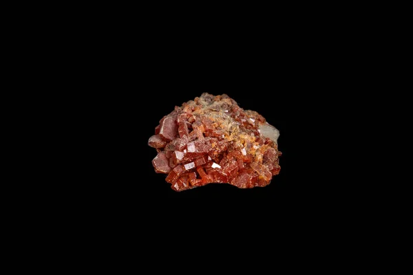 Macro mineral stone Vanadinite on a black background — Stock Photo, Image