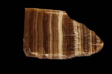 Makro siyah bir arka plan üzerinde mineral oniks mermer taş