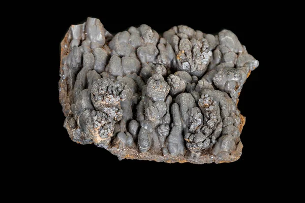 Macro de la piedra Hematita mineral sobre un fondo negro —  Fotos de Stock