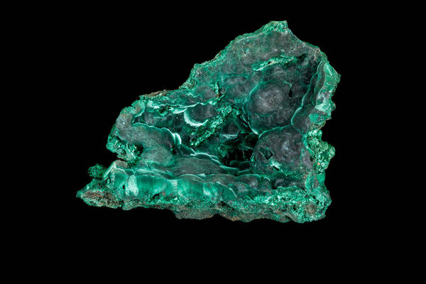 Macro of a mineral stone Malachite on a black background 