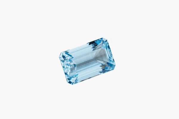 macro stone mineral faceted aquamarine on a white background close-up