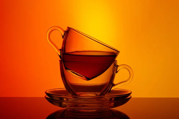 Beautiful Two Cups Tea Orange Yellow Background Close — Stock Photo, Image