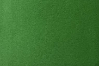Gerçek deri dokusu, yapay deri kaplama yeşil arka plan.