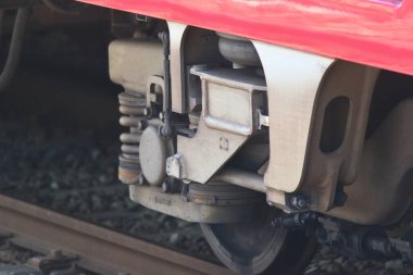 Zushi-Hayama, Kanagawa Prefecture, Japan, August 8, 2020: A long, coupled Keihin Kyuko train, a familiar sight on a midsummer day, leisurely passes along the tracks and platforms.