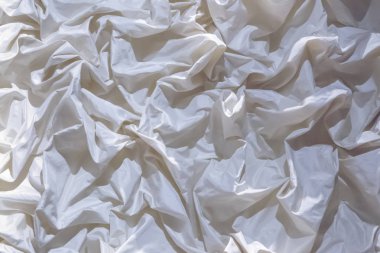 Beyaz kumaş dokusuna kadar kapatın