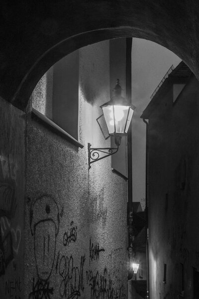 Old archway in Augsburgs old town, black and white