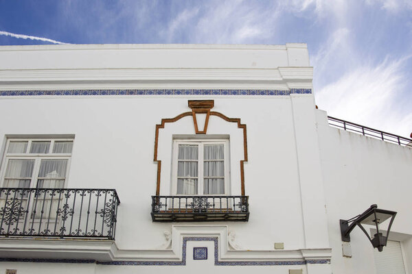 White facade of house in city of Conil de la Frontera, Spain