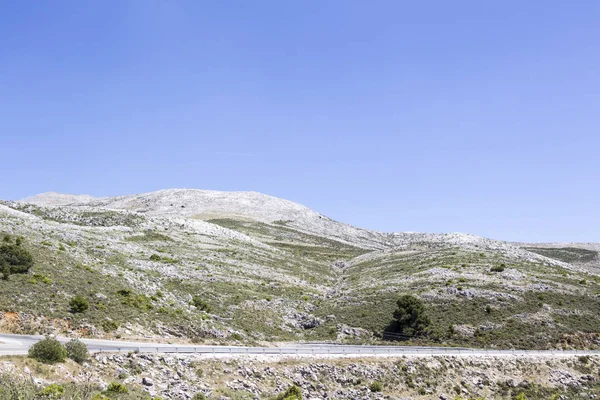 Mountain street in inland Andalucia in national Park Parque natural de la Sierra de Grazalema