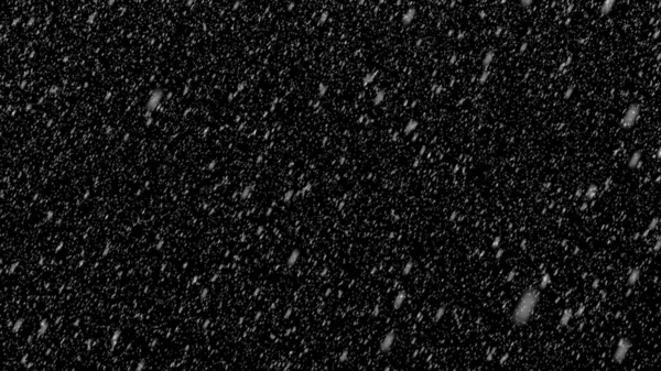 Nevadas sobre fondo negro. Textura superpuesta de ventisca realista. Copos de nieve desenfocados en movimiento. Elemento para el diseño de invierno. —  Fotos de Stock