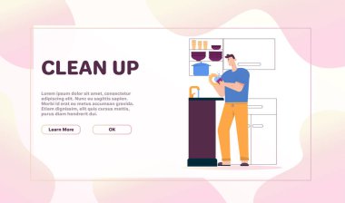 Adam lavaboda bulaşık yıkıyor, mutfakta temizlik yapıyor, bulaşık yıkıyor.