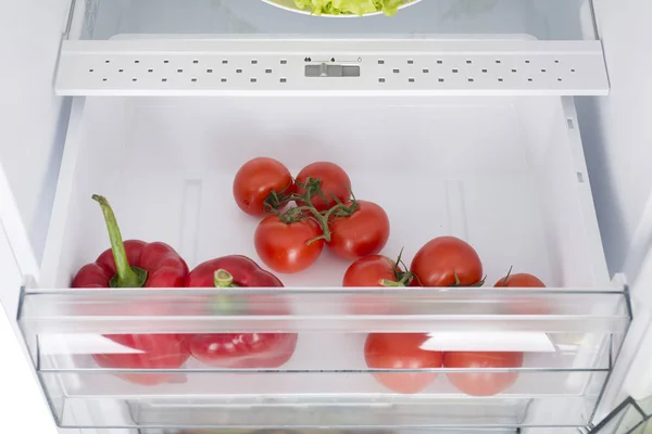 Open fridge full of fresh fruits and vegetables — Stock Photo, Image