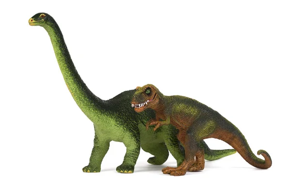 白い背景に分離された緑の恐竜 Diplodoc とティラノサウルス レックス プラスチックのおもちゃのモデル — ストック写真
