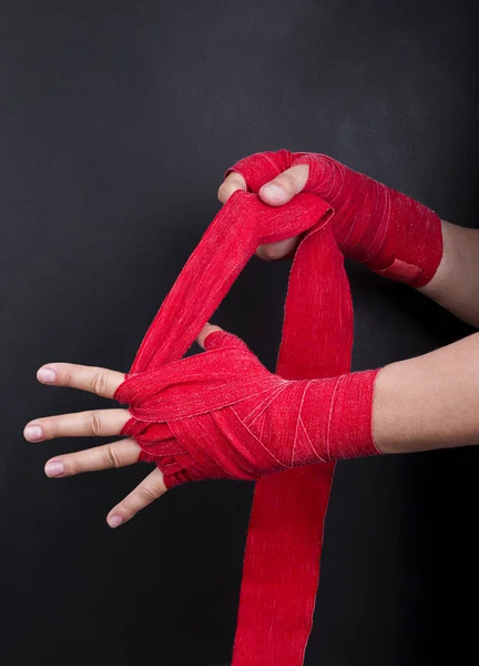 Stages of winding a hand protection tape for boxing gloves