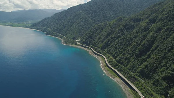 Highway on the viaduct by the sea. Philippines, Luzon