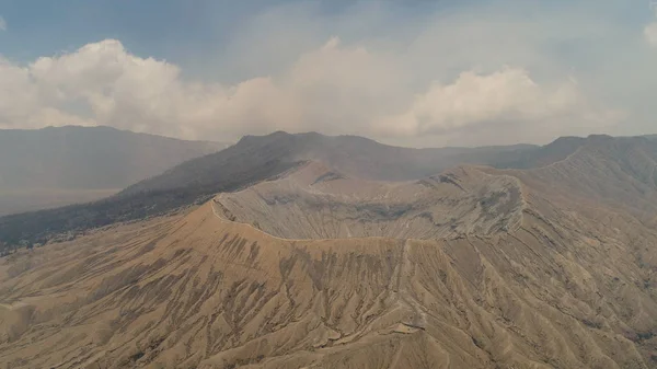 Mountain landscape with an active volcano — Stock Photo, Image