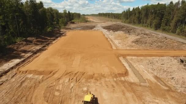 Construcción de una nueva carretera. — Vídeos de Stock