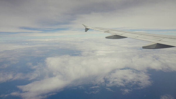 View from an airplane window on the ocean.