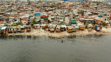 Slums and poor district of the city of Manila. clipart