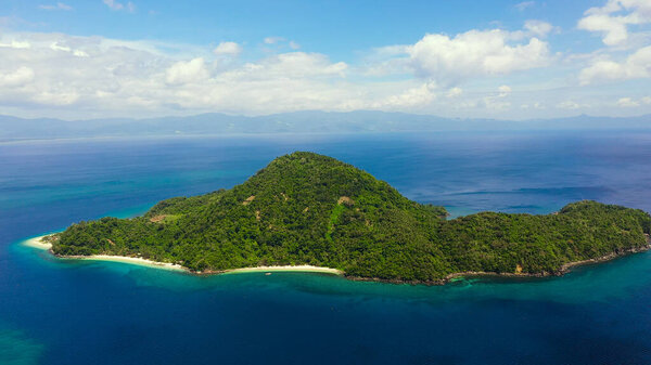 Blue sea with islands, aerial view. Seascape with a tropical island, Philippines.