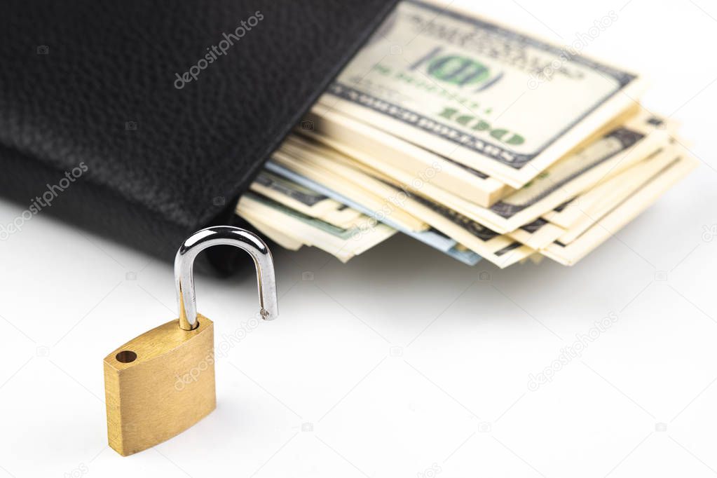 Business safety or financial protection or allow access. Heap of money in chain with open padlock isolated on white