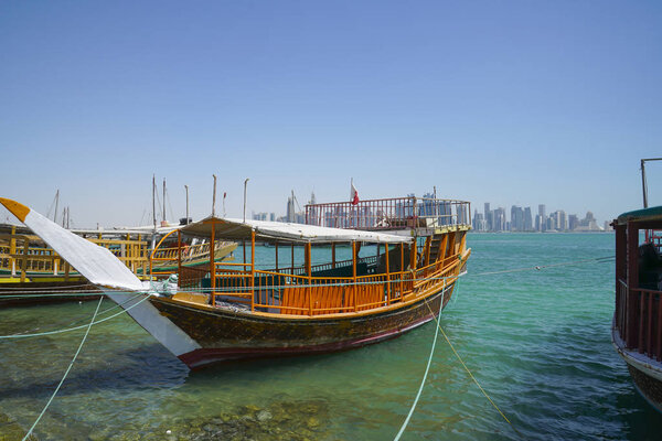 Dhow traditional style design moored along Doha Old Town waterfr